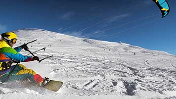 Grab the kite and don't let go, the wind is just perfect! If you want to experience the fun of snow kiting without the extreme cold and a lot less money, then set the Snow Kiting theme on your homepage and let the adventure start!